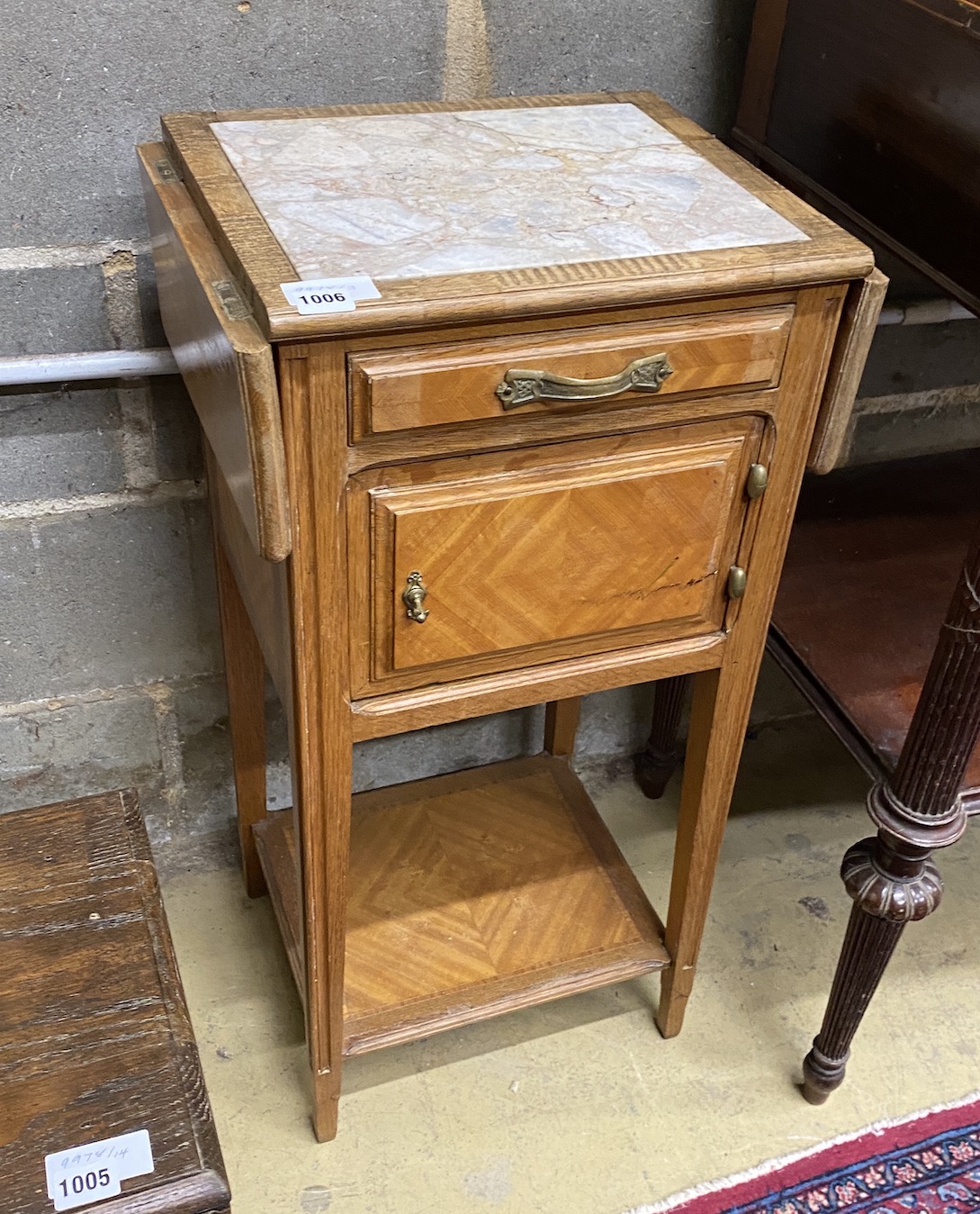 A late 19th century French marble top drop flap bedside cabinet, width 42cm, depth 33cm, height 82cm